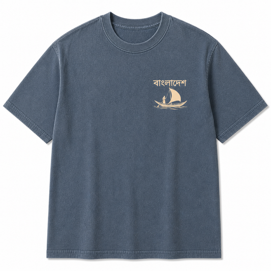 Blue t-shirt with a boat and text design on a white background